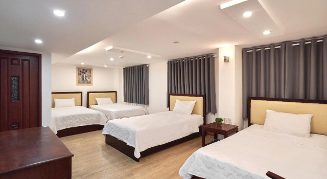 Кровать в общем номере King Hotel Sai Gon Airport 