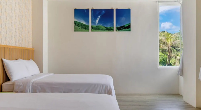 Четырёхместный номер Standard с балконом Green Beauty Homestay