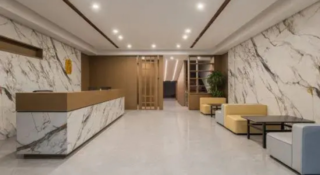 Zhangjiagang Ganrong Shangju Hotel (Jingang Central Plaza), Varaa Hotelli Suzhou Kiina