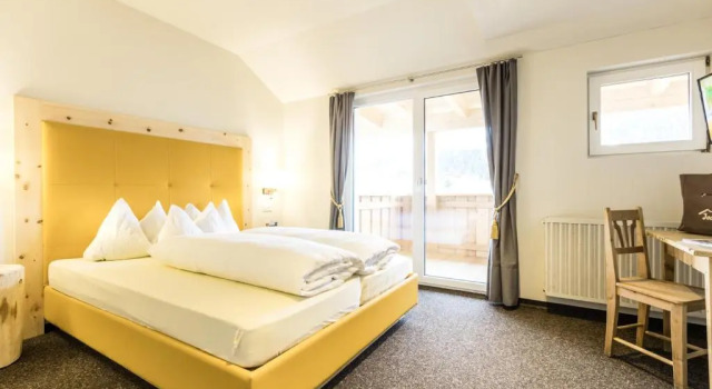Четырёхместный номер Standard Дуплекс Berghotel Jochgrimm - Your Dolomites Home