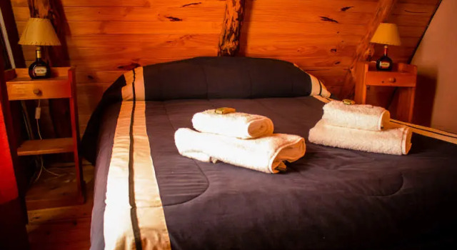 Кровать в общем номере Patagonia Encantada