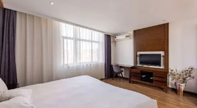 Люкс Business Wanju Business Hotel (Shanghai Wusong International Cruise Terminal)