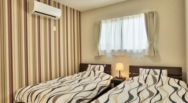 Семейный коттедж с 2 комнатами с балконом Cottage Sea Wind Nakijin