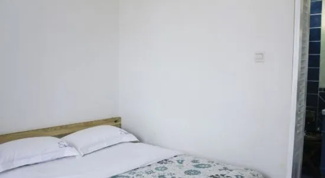 Suite 2 Schlafzimmer mit Poolblick Slow House