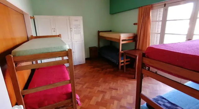 Кровать в общем номере Alamo Hostel & Suites