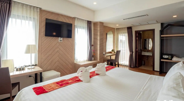 Номер Deluxe Porpiang Hotel - โรงแรมพอเพียง