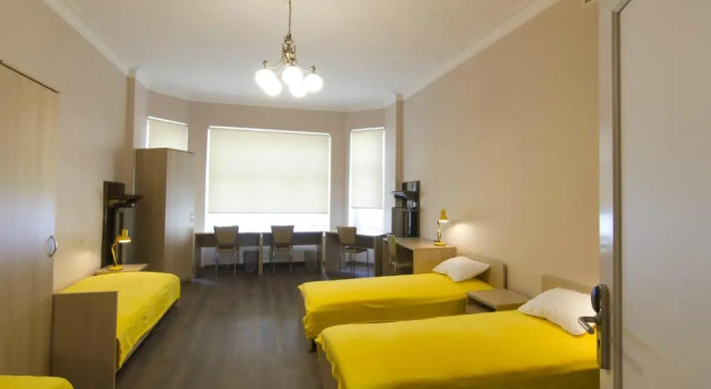 Кровать в общем номере Valdemara Residence