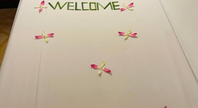 Кровать в общем номере VPlus Hotel