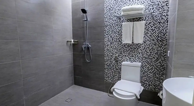 Номер Deluxe One Central Hotel & Suites