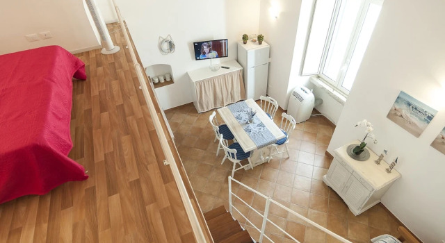Апартаменты c 1 комнатой Casa Vacanza Madonnella 12