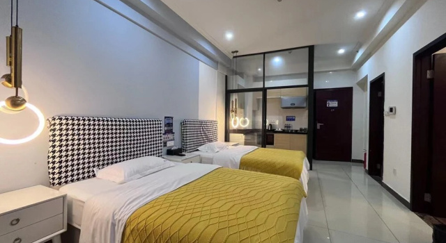 Трёхместный номер Deluxe Yi Long International Apartment