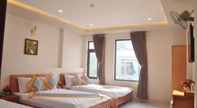 Кровать в общем номере Nhan Anh Quy Nhon Hotel