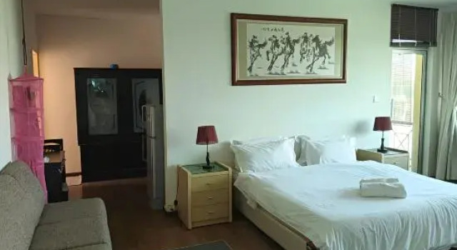 Кровать в общем номере Natol Homestay - Kuching Home Penthouse Airport Road