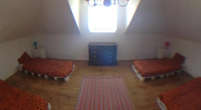 Кровать в общем номере Casa Branca
