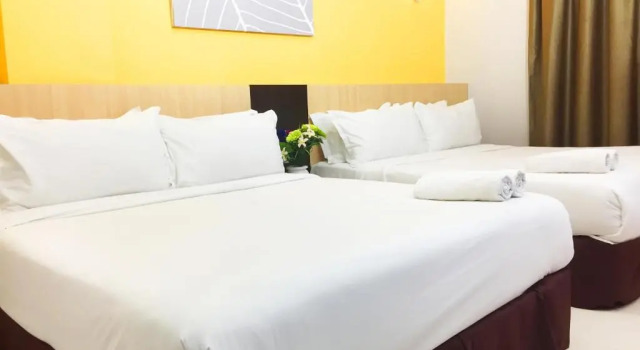 Четырёхместный семейный номер Standard Temasek Hotel