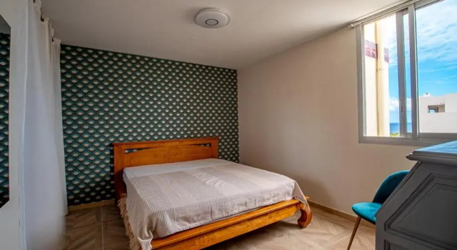 T3 - L' Anaxa - 65m² - champ fleuri, 2 chambres., Book Hotel Hotels in Saint-Denis with Parking, near Trinity Park, Parking