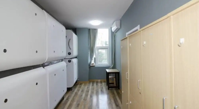 Кровать в общем номере Meet Fish International Youth Hostel