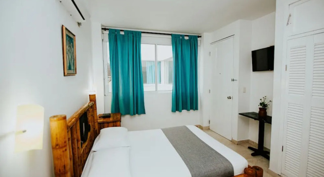 Supérieure quadruple chambre Hotel NG