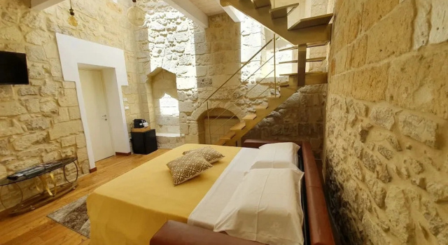 Dobbelt over to etager juniorsuite Le Nicchie luxury rooms