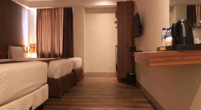 Трёхместный номер Standard LAMORA Sagan Yogyakarta - formerly H Boutique Yogyakarta