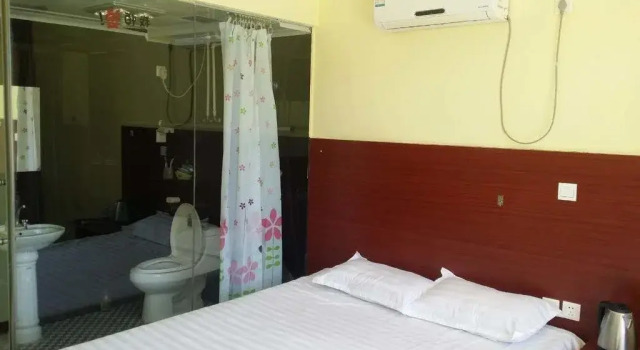 Xinjia Inn, Забронировать Отель Стадион Jinzhou Ляонин