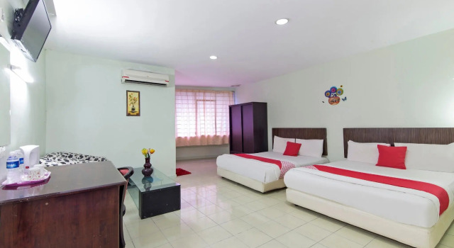 Семейный люкс OYO 90118 Suntex Hotel