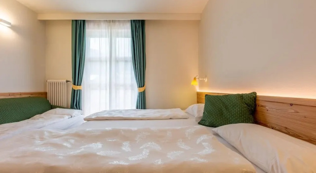 Четырёхместный номер Comfort Alpholiday Dolomiti Wellness & Family Hotel