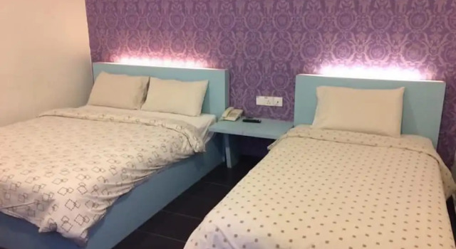 Трёхместный семейный номер Standard Kozi Hotel by Ardens - Taman Bukit Indah