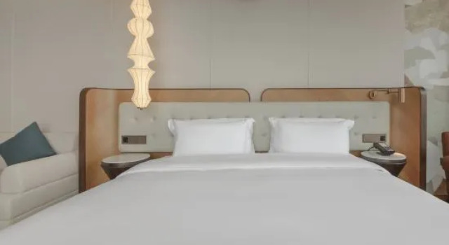 Люкс Executive Qingdao Book K Hotel (Stone Old Man Seaside Bathing Beach)
