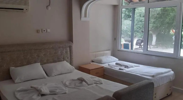 Четырёхместный номер Standard Selina Hotel