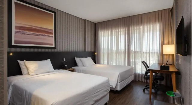 Четырёхместный номер Superior Hilton Garden Inn Praia Brava