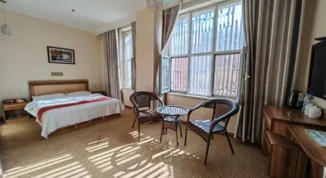 Korla Damo Inn, Rezerwuj Hotel Hotele w Korla z parkingiem, Parking