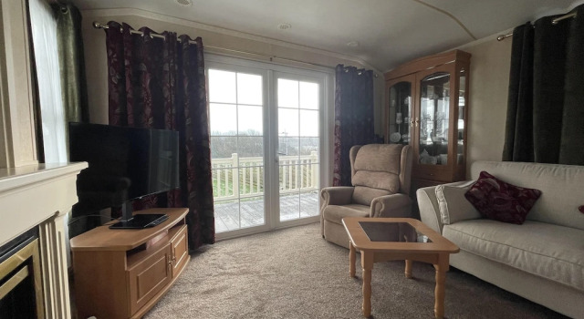 Captivating 2-bed Static Caravan on Private Land, Book Feriehus Sommerhuse i Henryd, Hytte