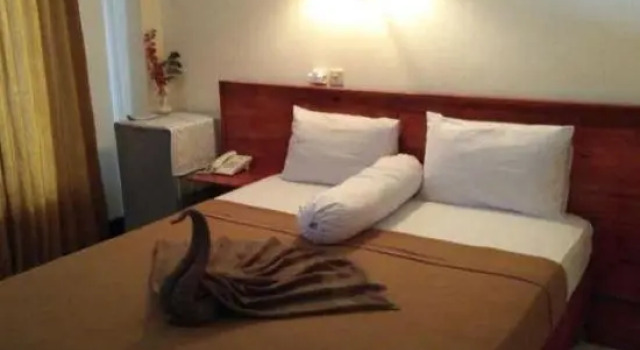 Kurnia Jaya Hotel, Забронировать Отель Отели Матарам с парковкой, рядом с Lombok Epicentrum Mall, Парковка