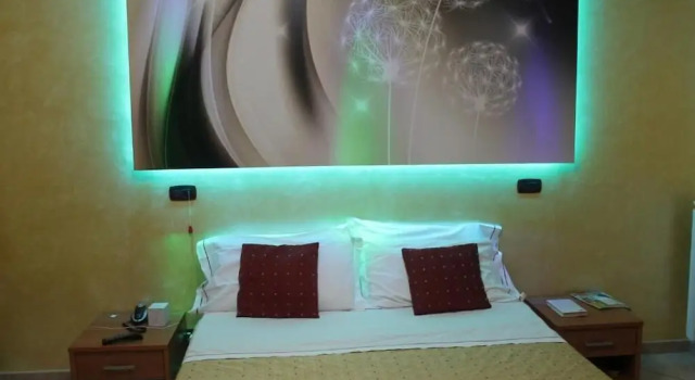 Четырёхместный номер Comfort Hotel Il Giardino degli Aranci