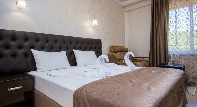 Четырёхместный номер Comfort с балконом Отель Гранд Ной