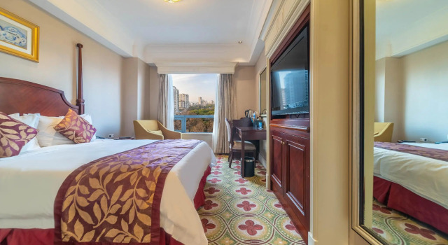 Номер Deluxe Ramada Yichang Hotel