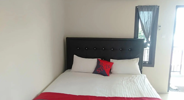 Номер Deluxe OYO 91022 STeZe Homestay Syariah