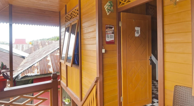 Номер Deluxe Hotel O Pulisan Ekowisata Homestay Near Wisata Pantai Desa Pulisan (Pulisan Beach Tour)