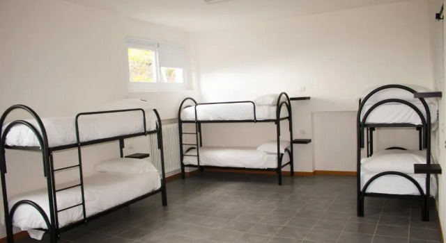 Кровать в общем номере Indomita Alps Hostel
