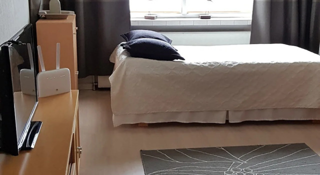 Cosy studio in front of a small church, Buchen Sie Ferienwohnung Savonlinna Ostfinnland