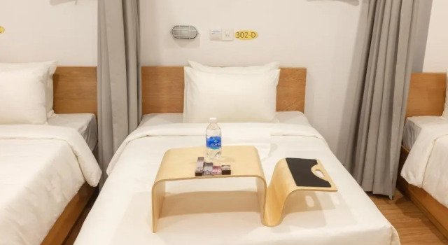 Кровать в общем номере Đại Nam SG Hotel