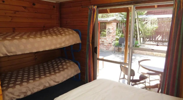 Кровать в общем номере Hanmer Backpackers