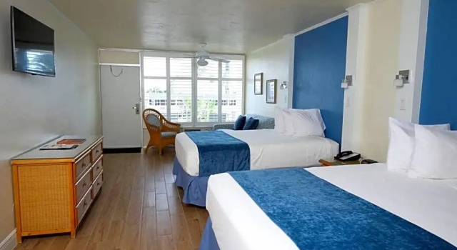 Четырёхместный номер Standard с красивым видом из окна Outrigger Beach Resort
