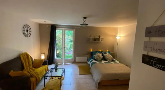 Appartement Cosy avec jardin privatif et garage