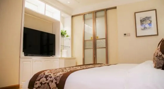 Семейный люкс Deluxe Baotou Rare Earth International Hotel