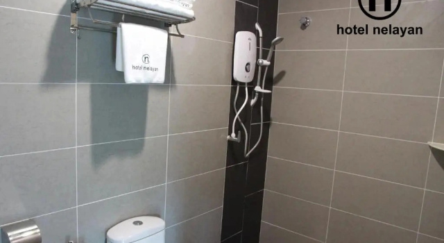 Четырёхместный семейный люкс Hotel Nelayan