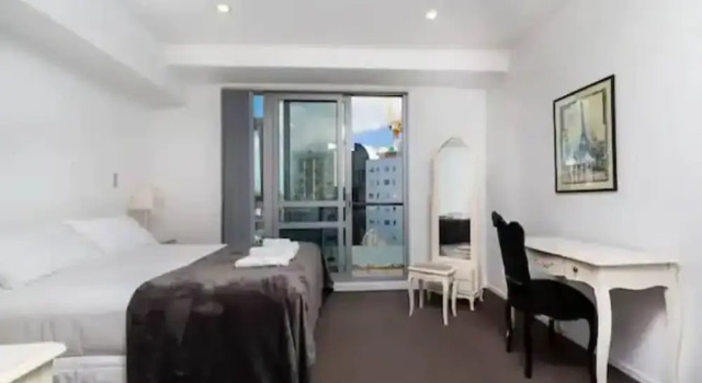 Spacious Home with Balcony - Free Carpark!