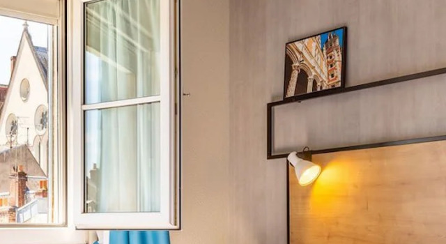 Кровать в общем номере ibis Blois Centre Château