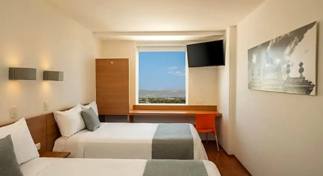 Четырёхместный номер Superior Sleep Inn Leon Antares